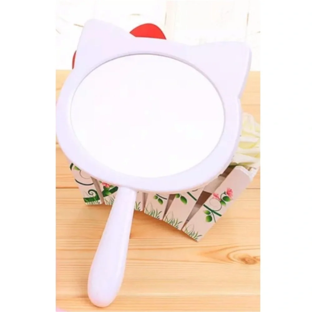 Hello kitty handheld makeup mirror. NWT